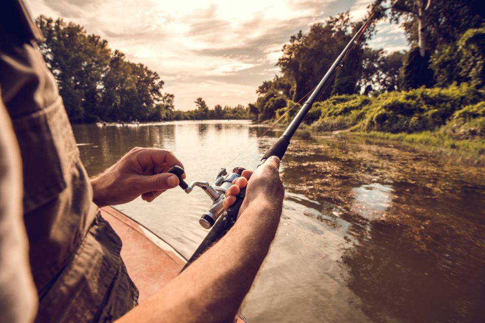 man fly-fishing on the river