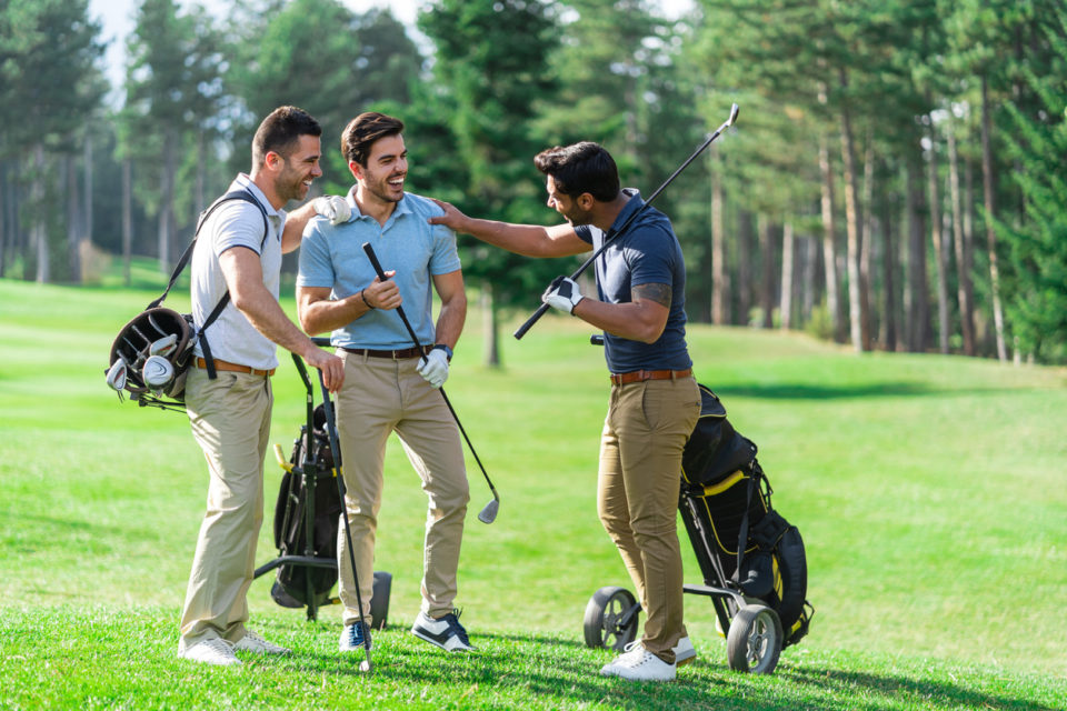 Friends Playing Golf on a Beautiful Sunny Day