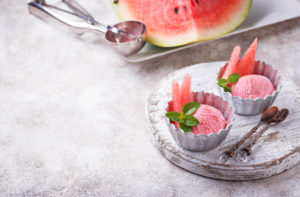 Watermelon ice cream in metal bowls